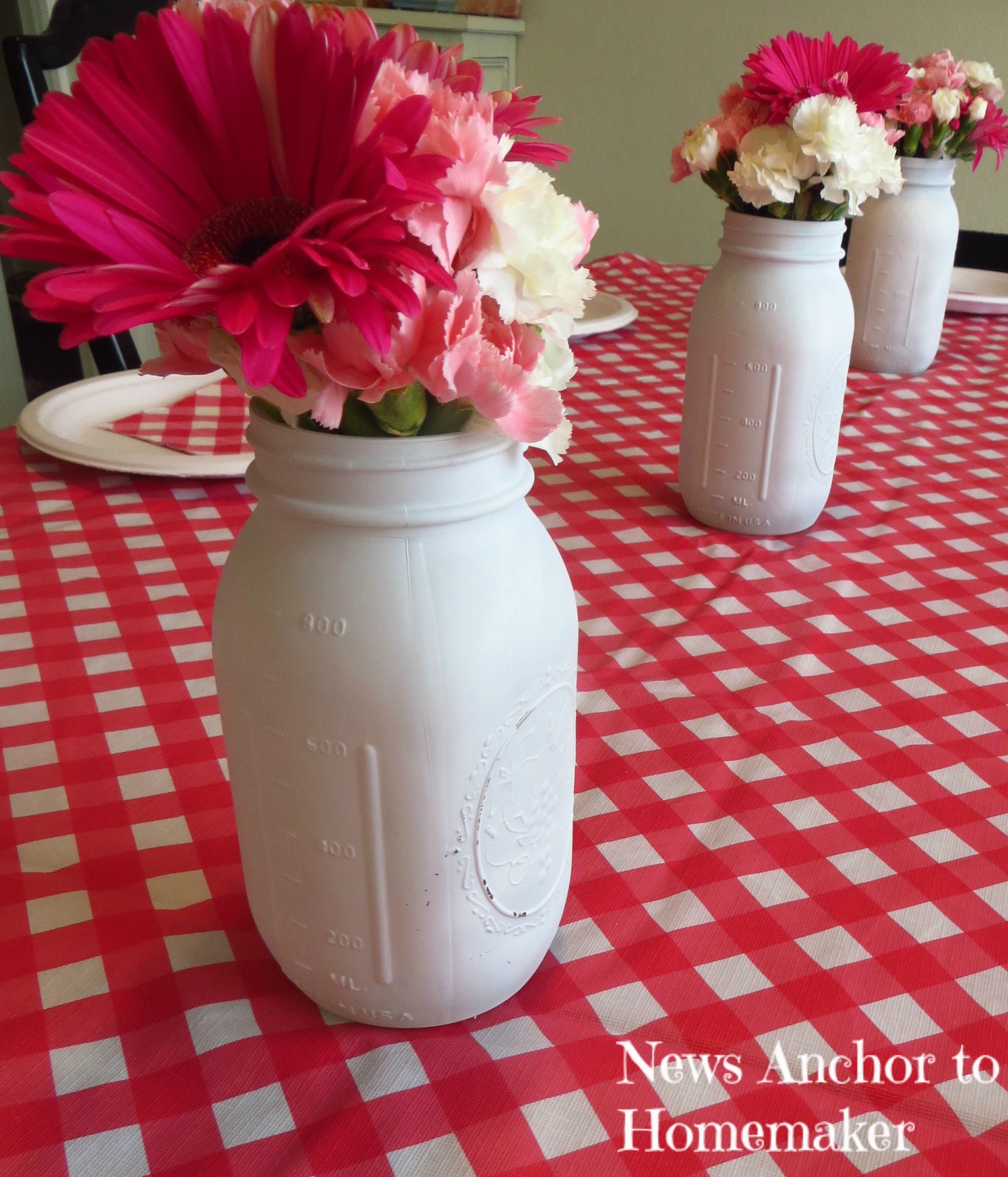 Spray Painted Mason Jars with Flowers, perfect Baby Shower decoration www.jillianbenfield.com