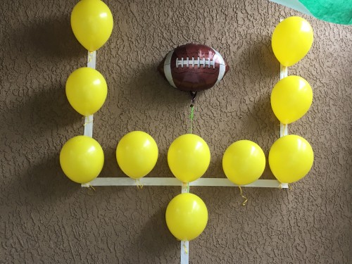 football goal posts uprights yellow balloons