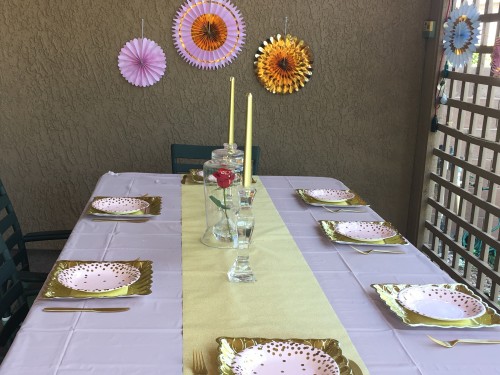 pink and gold beauty and the beast birthday party table